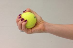 Tennis ball squeeze